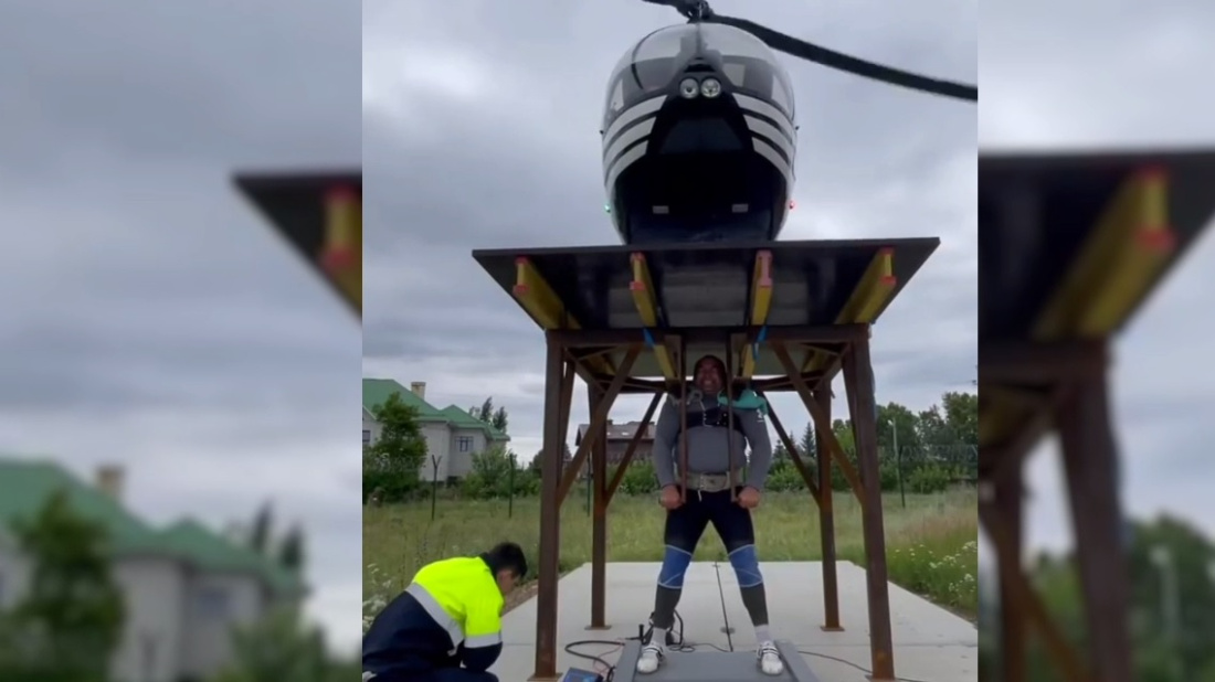 Шокирующее видео: силач из Башкирии поднял платформу с работающим вертолетом